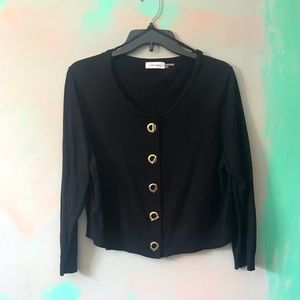 Black cardigan sweater with toggle gold colored buttons